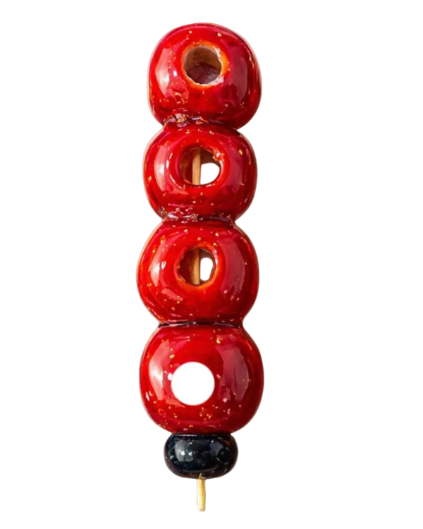 Traditional Chinese hawthorn tanghulu skewer — the original sweet-and-sour street snack, glazed in crystal sugar