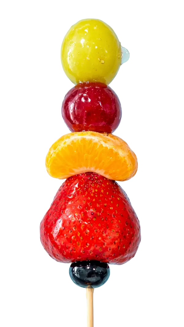 Mixed fruit tanghulu skewer with strawberry, mandarin orange, and red grape in crystal glaze