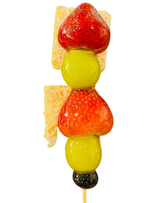 Strawberry and grape tanghulu skewer with crispy milk skin layer and double crystal glaze